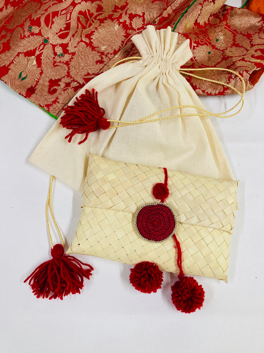 Diwali gifting palm Leaf pouch red pompom medium